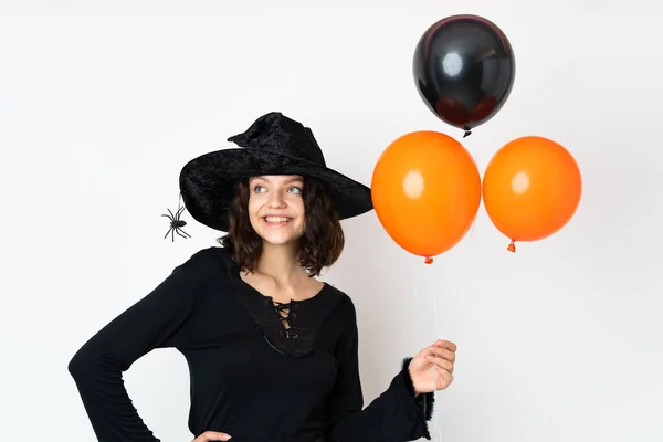 Jonge Heks Met Zwarte Oranje Luchtballonnen Poserend Met Armen Heup — Stockfoto