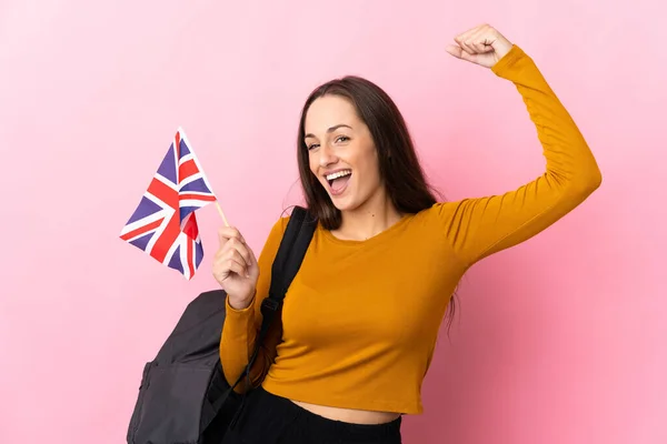 Young Hispanic Woman Holding United Kingdom Flag Celebrating Victory — Stock Photo, Image