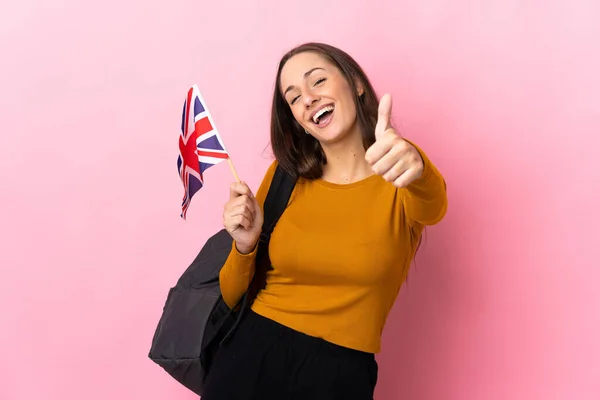 Young Hispanic Woman Holding United Kingdom Flag Thumbs Because Something — Stock Photo, Image