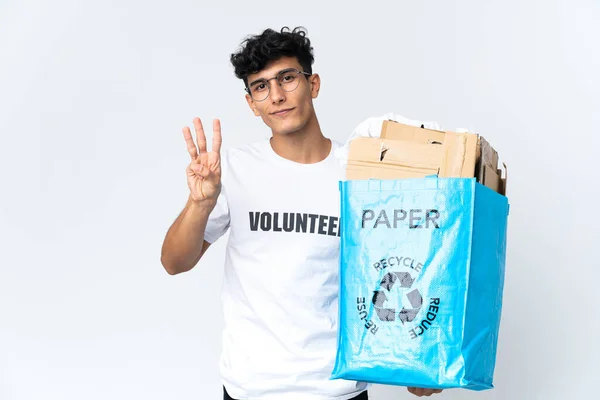 Joven Sosteniendo Una Bolsa Reciclaje Llena Papel Feliz Contando Tres — Foto de Stock