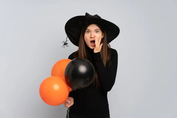 Young Witch Holding Black Orange Air Balloons Surprise Shocked Facial — Stock Photo, Image