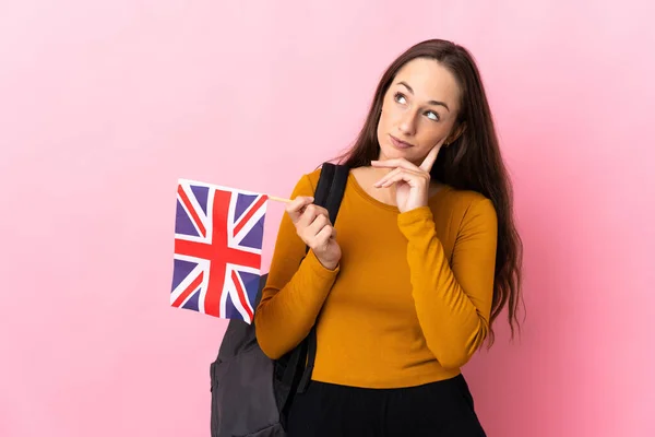 Young Hispanic Woman Holding United Kingdom Flag Thinking Idea While — Stock Photo, Image