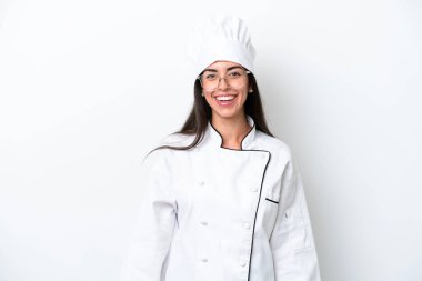 Young chef woman over white background with glasses and happy