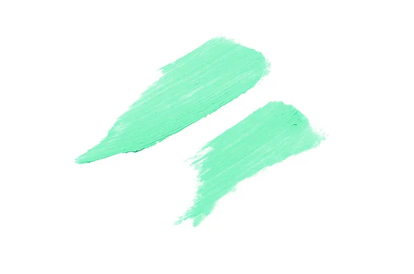 Smear en textuur van lippenstift of acrylverf geïsoleerd op witte achtergrond. Turquoise kleur — Stockfoto