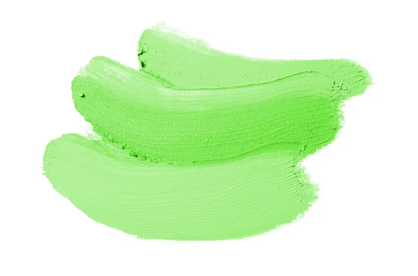 Smear en textuur van lippenstift of acrylverf geïsoleerd op witte achtergrond. Groene kleur — Stockfoto
