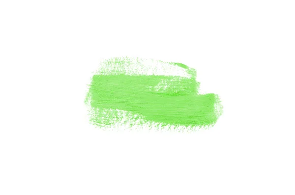Mancha e textura de batom ou tinta acrílica isolada sobre fundo branco. Cor verde — Fotografia de Stock