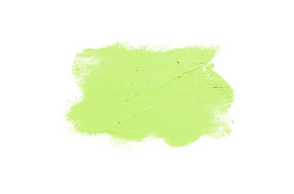 Mancha e textura de batom ou tinta acrílica isolada sobre fundo branco. Cor verde claro — Fotografia de Stock