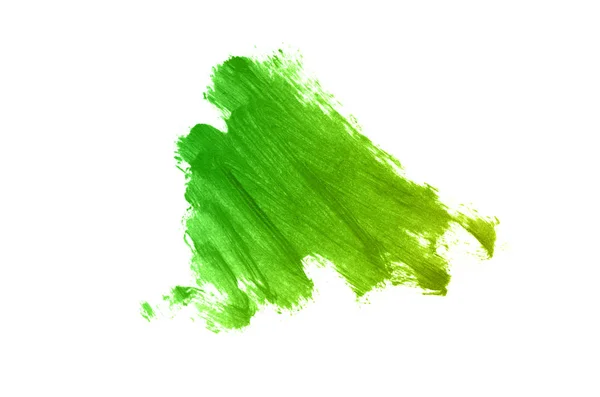 Mancha y textura de lápiz labial o pintura acrílica aislada sobre fondo blanco. Color amarillo verde — Foto de Stock