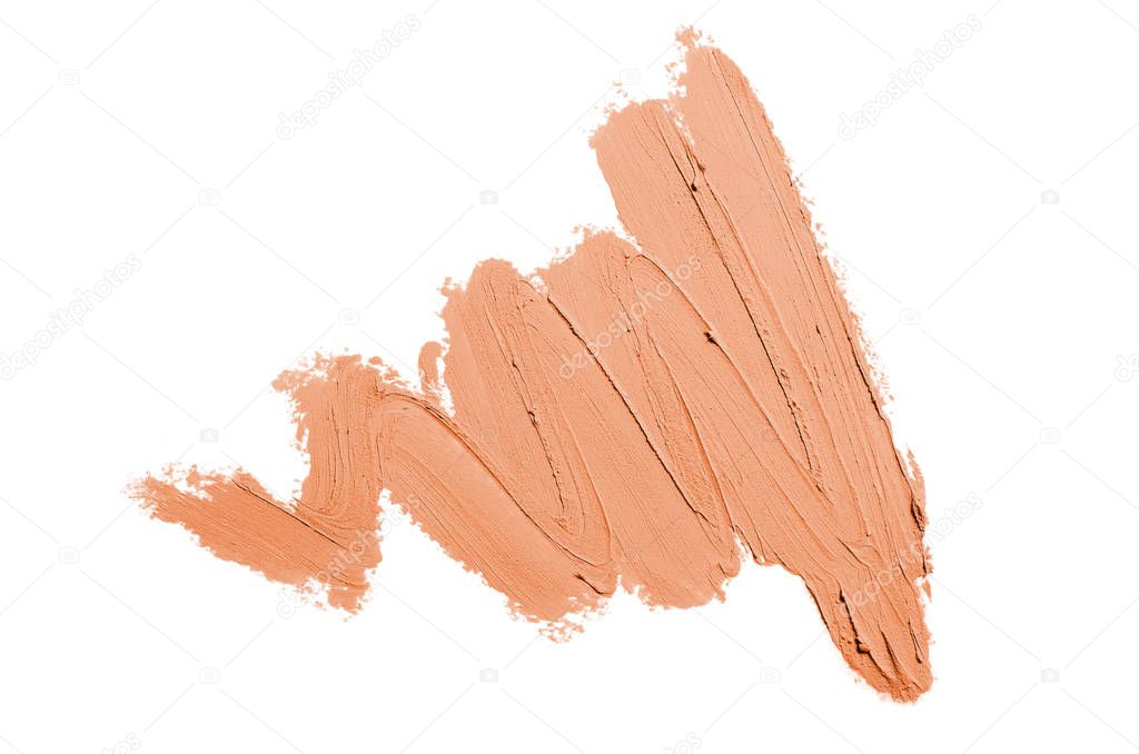 Smear and texture of lipstick or acrylic paint isolated on white background. Stroke of lipgloss or liquid nail polish swatch smudge sample. Element for beauty cosmetic design. Orange color