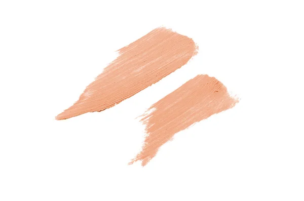 Smear en textuur van lippenstift of acrylverf geïsoleerd op witte achtergrond. Oranje kleur — Stockfoto