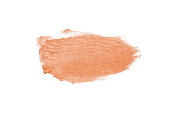 Мазок и текстура помады или акриловой краски изолированы на белом фоне. Оранжевый цвет — стоковое фото