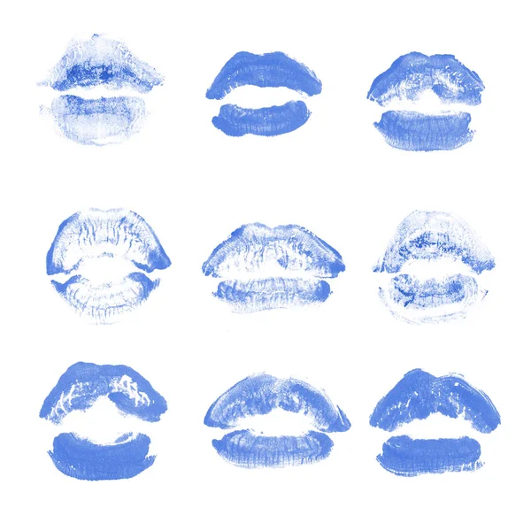 女性の唇の口紅のキスプリントは、白で隔離されたバレンタインデーのために設定されています。青色 — ストック写真