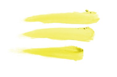 Smear ve ruj veya akrilik boya beyaz arka plan üzerinde izole doku. Lipgloss veya sıvı oje leke örneği inme. Güzellik kozmetik tasarım için eleman. Sarı renk