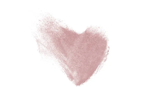 Liquid lipstick heart shape smudge isolated on white background.