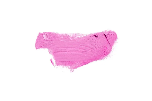 Мазок и текстура помады или акриловой краски изолированы на белом фоне. Розовый цвет — стоковое фото