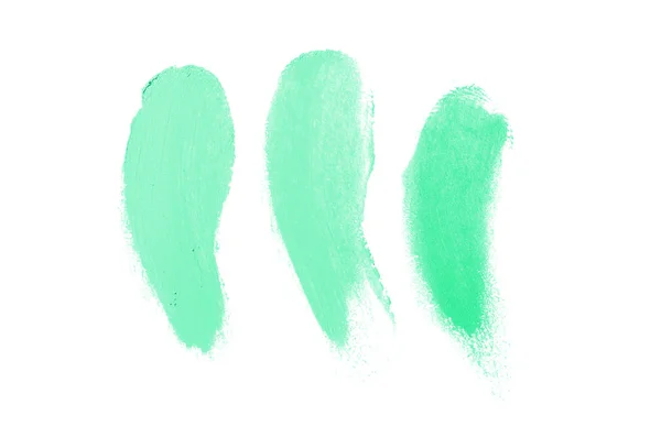 Rozmaz i tekstury szminki lub farby akrylowej na białym tle. Kolor turkusowy — Zdjęcie stockowe