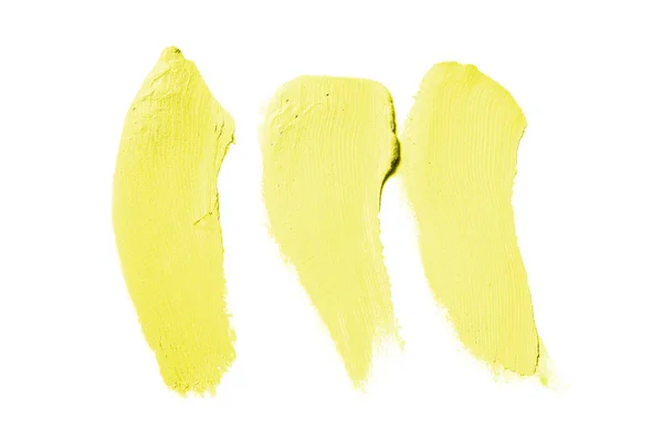 Smear and texture of lipstick or acrylic paint isolated on white background. Yellow color — Stock Photo, Image