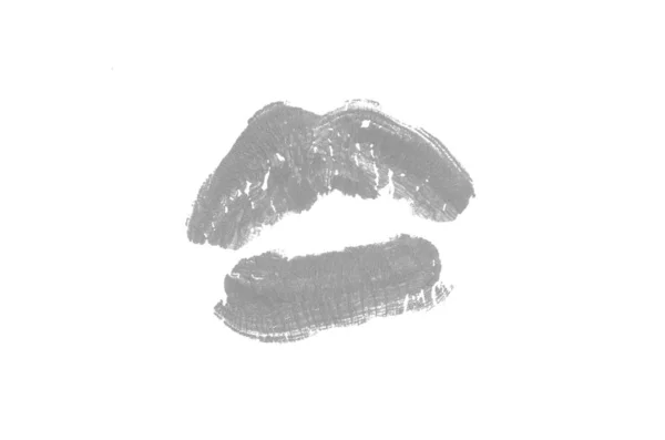 След поцелуя помады на белом фоне. Красивые губы изолированы. Серый цвет — стоковое фото