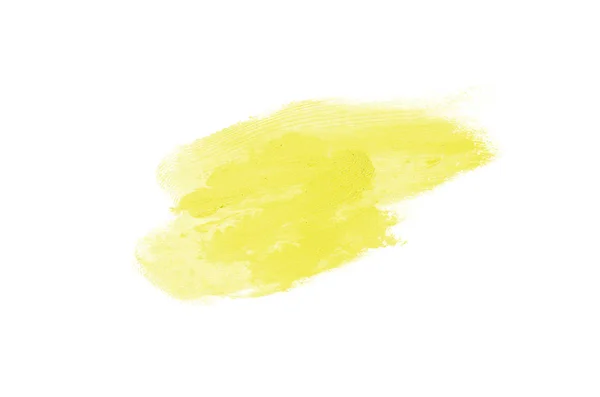 Spalmare e consistenza di rossetto o vernice acrilica isolata su sfondo bianco. Colore giallo — Foto Stock