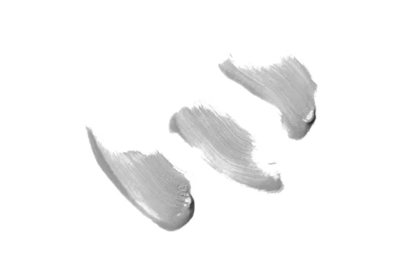 Smear and texture of lipstick or acrylic paint isolated on white background. Gray color — Stock Photo, Image