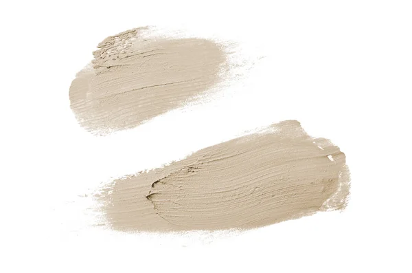 Rozmaz i tekstury szminki lub farby akrylowej na białym tle. Brązowy kolor — Zdjęcie stockowe