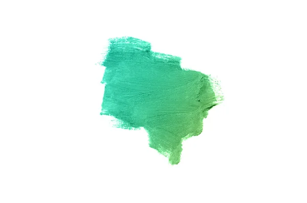 Smear and texture of lipstick or acrylic paint isolated on white background. Emerald color