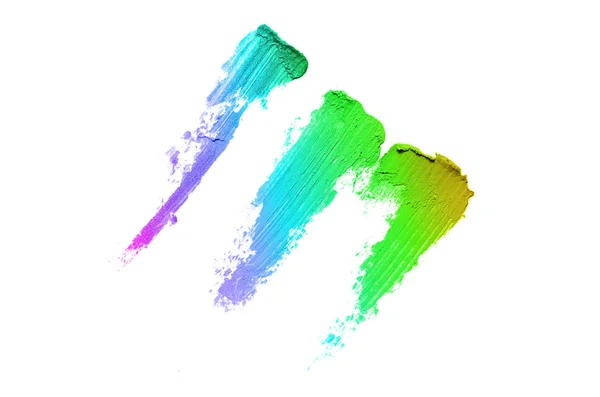 Smear en textuur van lippenstift of acrylverf geïsoleerd op witte achtergrond. Regenboog kleur — Stockfoto