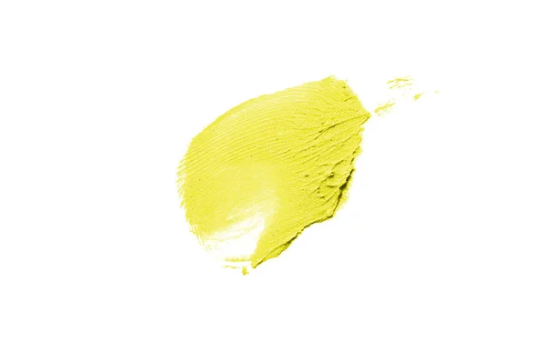 Mancha y textura de lápiz labial o pintura acrílica aislada sobre fondo blanco. Color amarillo — Foto de Stock