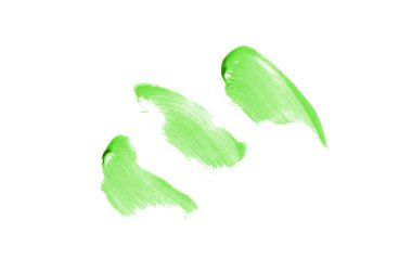 Smear ve ruj veya akrilik boya beyaz arka plan üzerinde izole doku. Lipgloss veya sıvı oje leke örneği inme. Güzellik kozmetik tasarım için eleman. Yeşil renk