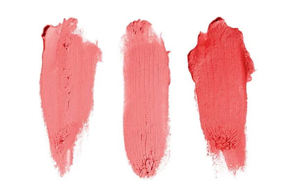 Frottis et texture de rouge à lèvres ou de peinture acrylique isolés sur du blanc — Photo