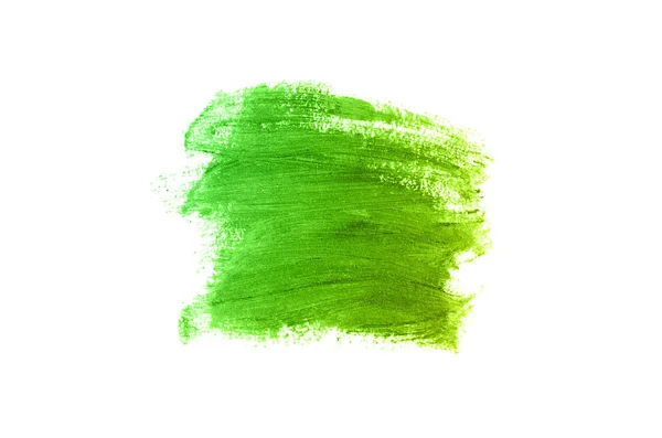 Mancha y textura de lápiz labial o pintura acrílica aislada sobre fondo blanco. Color amarillo verde — Foto de Stock