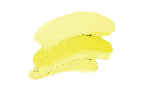 Mancha y textura de lápiz labial o pintura acrílica aislada sobre fondo blanco. Color amarillo — Foto de Stock