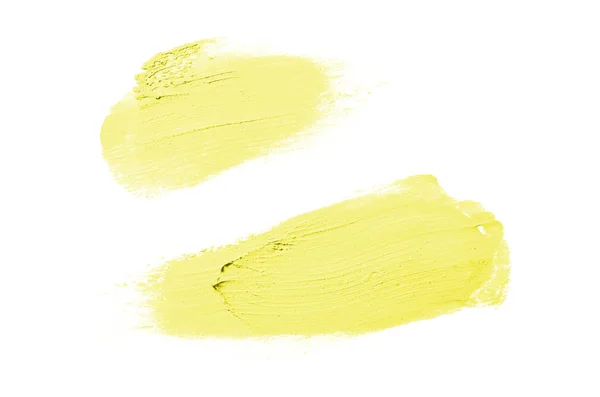 Smear and texture of lipstick or acrylic paint isolated on white background. Yellow color — Stock Photo, Image