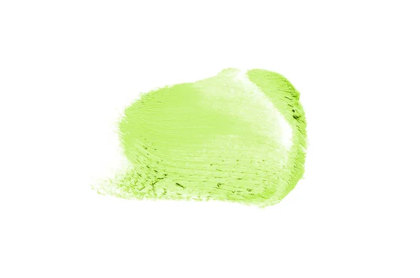 Mancha e textura de batom ou tinta acrílica isolada sobre fundo branco. Cor verde claro — Fotografia de Stock