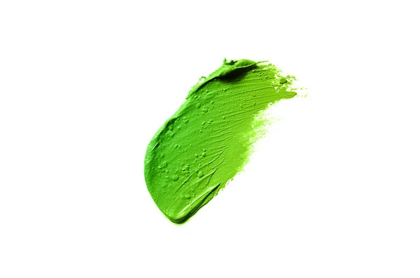 Smear and texture of lipstick or acrylic paint isolated on white background. Green yellow color — Stock Photo, Image