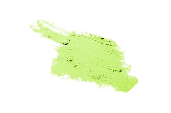 Mancha y textura de lápiz labial o pintura acrílica aislada sobre fondo blanco. Color verde claro —  Fotos de Stock