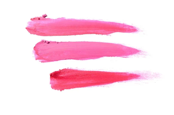 Smear en textuur van lippenstift of acrylverf geïsoleerd op witte achtergrond. Magenta kleur — Stockfoto