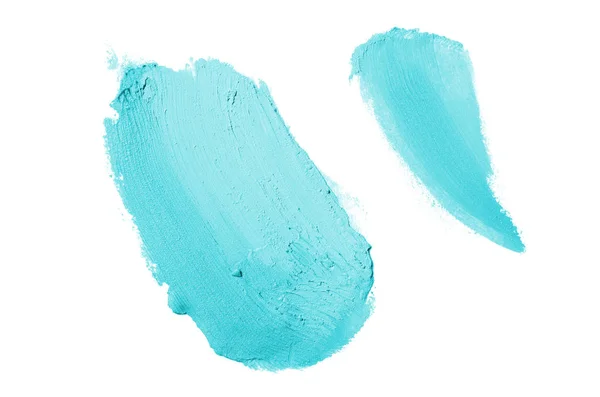 Smear en textuur van lippenstift of acrylverf geïsoleerd op witte achtergrond. Licht blauwe kleur — Stockfoto