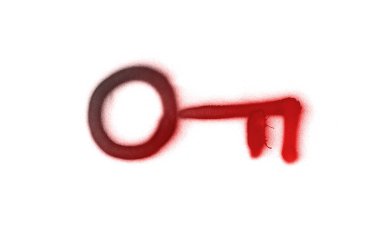 Grafiti anahtar işareti beyaz izole arka plan üzerine püskürtülür