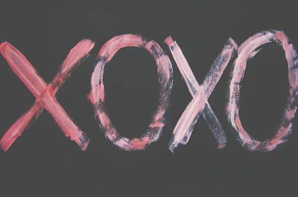 Επιγραφή Ένα Μαύρο Φόντο Ροζ Χρώματα Xoxo — Φωτογραφία Αρχείου