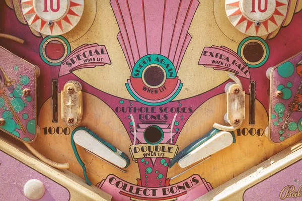 Close up of a weathered vintage pinball machine — Stock Photo, Image