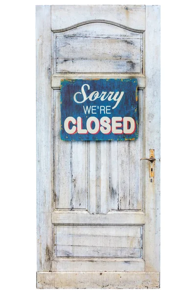 Weathered wooden door with closed sign — Stock Photo, Image