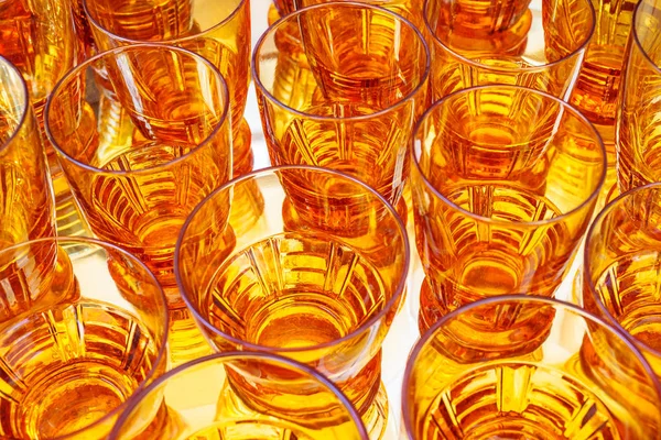 Vintage orange alcohol glasses — Stock Photo, Image