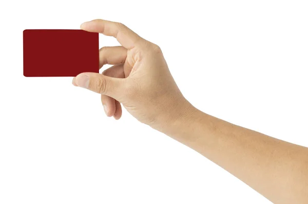 Beyaz arkaplan kırpma yolunda kırmızı kredi kartını tutan el.