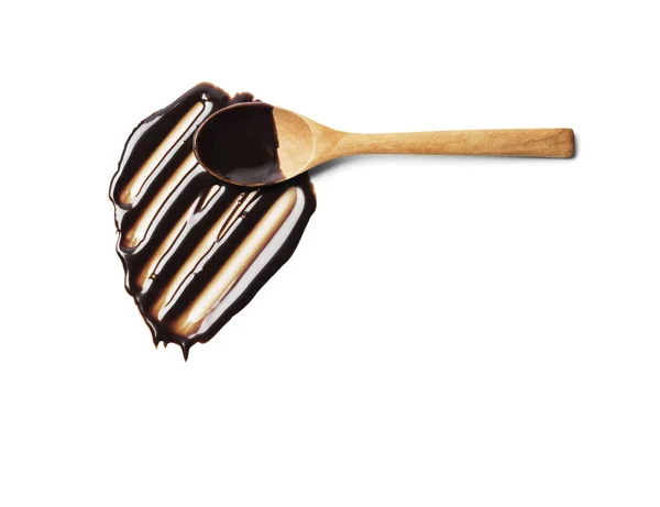 Spoon with liquid chocolate — Stock Photo, Image