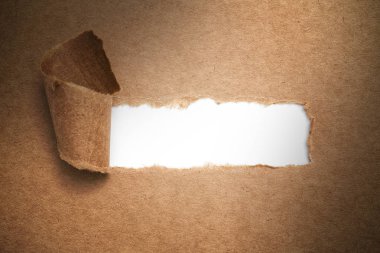 Blank white space in torn brown paper clipart
