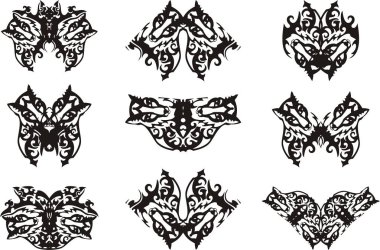 Kelebekler şeklinde stilize tilki kafaları. T-shirt tasarımları, bir nakış, bir dövme, vb için süslü çiçek elemanları ile tilki kafaları gibi, bir kelebeğin kanatlarında olağandışı desenler,.