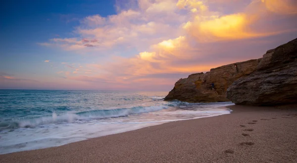 beach with rocks and sky with effects of photography