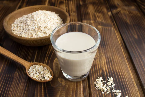 Hafermilch Glas Auf Dem Braunen Holzgrund Gesundes Getränk — Stockfoto