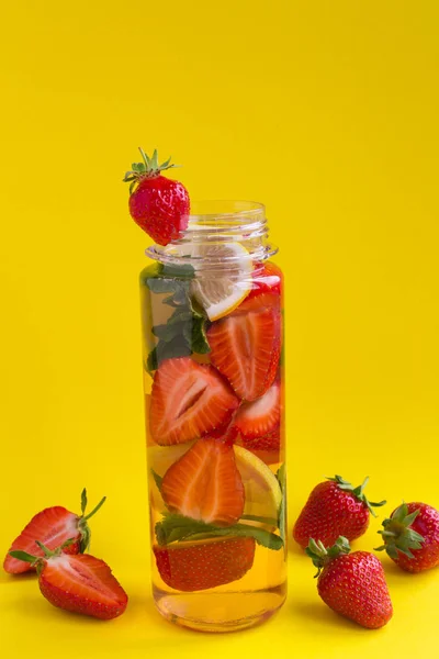 Infused Detox Water Strawberry Lemon Bottle Yellow Background Copy Space — Stock Photo, Image